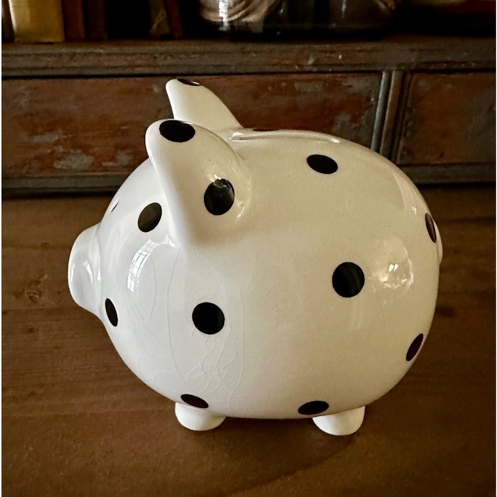 CHILDS PIGGY BANK, WHITE CERAMIC WITH BLACK POLKA DOT. RUBBER STOPPER ON BOTTOM.